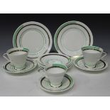 An Art Deco Shelley bone china part tea and coffee set, each piece decorated with green and silvered