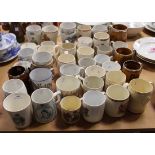 A collection of commemorative china, including a blue printed Queen Victoria Diamond Jubilee mug,