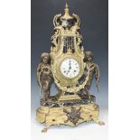 A 20th Century Italian gilt metal mantel clock with German eight day movement striking on a bell,