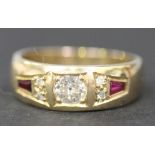 A 9ct gold ring, mounted with the principal cushion shaped diamond between red and colourless gem