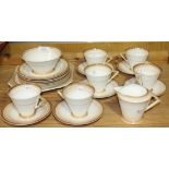 An Art Deco Shelley bone china part tea service with brown banded decoration, comprising six conical