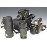 A Mamiya M645 camera, No. J73965, with Mamiya-Sekor C 1:2.8 f=80mm lens, No. 30578, a Mamiya 645E