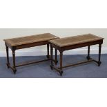 A pair of late 19th/early 20th Century walnut window seats, the moulded tops inset with canework,