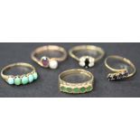A 9ct gold and emerald set five stone ring, a gold and turquoise set five stone ring, a 9ct gold