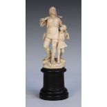 A 19th Continental carved ivory full-length figure group of a hunter and his son, the father holding