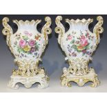 A pair of Paris porcelain vases and integral stands, mid-19th Century each flattened ovoid body