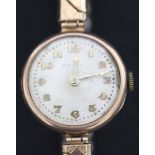A Rolex 9ct gold circular cased lady's wristwatch, the jewelled lever movement detailed 'Rolex Prima