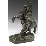 After Guillaume Cousteau - a late 19th Century French brown patinated cast bronze equestrian