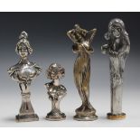 A group of four Art Nouveau cast metal desk seals, comprising a silvered cast bronze seal with