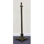 An early 20th Century brass Corinthian column lamp standard, the fluted column raised on a stepped