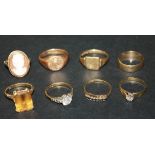 A 9ct gold signet ring, a gold signet ring detailed '9ct', a 9ct gold wedding ring, a gold and