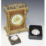 A late 19th Century brass mounted leather cased mantel timepiece, the chapter ring with Arabic