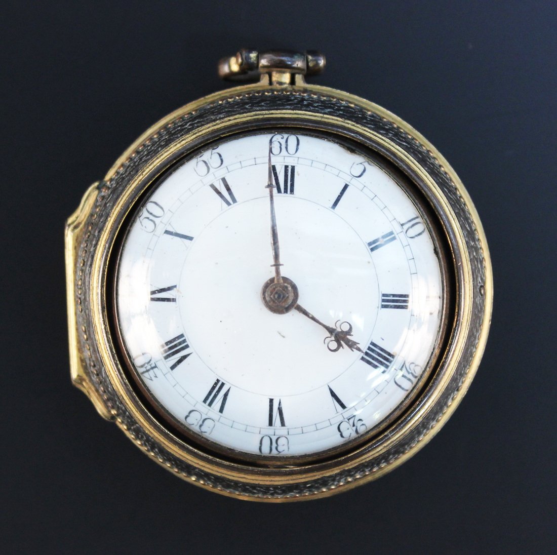 A gilt on copper and leather keywind open-faced pair cased gentleman's  pocket watch, the gilt fusee