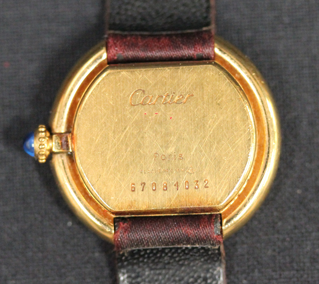 A Cartier gilt metal cased lady's wristwatch, the signed white dial with black Roman numerals and - Image 3 of 3