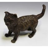 An Austrian patinated cast bronze figure of a standing cat, marked 'Geschützt' to tail, length