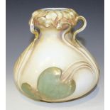 An Art Nouveau Amphora porcelain vase, the baluster body moulded in relief with green lily pads on