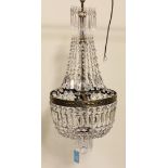 A mid-20th Century cut glass and gilt brass bag ceiling light, the central bellflower decorated