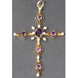 A gold, amethyst and diamond set pendant cross in an open work design, mounted with the principle