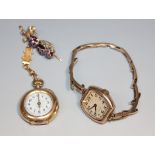 A gold, diamond set and enamelled keyless wind open-faced pendant lady's fob watch, the case back