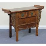 A 20th Century Chinese elm side table with a shaped rectangular top above two frieze drawers and