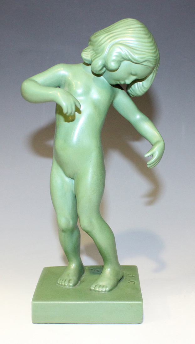 A Danish P. Ipsens Enke jade green glazed terracotta figure of 'Venus Kalipygos', early 20th