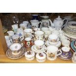 A large collection of commemorative ceramics, including a George VI coronation mug designed by