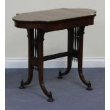 A late 19th Century burr oak games table, the shaped top with reversible chessboard, raised on