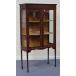 An Edwardian mahogany glazed display cabinet with crossbanded and line inlaid decoration, the