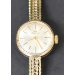 A Roidor 9ct gold bracelet lady's wristwatch, with a signed circular silvered dial, with gilt