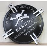 A Howard Harvestore painted aluminium silo chamber cover, marked with skull and crossbones motif and