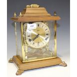 A 20th Century walnut and four glass mantel clock with eight day movement chiming on eight gongs,