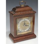 A mid-20th Century mahogany cased mantel timepiece, the brass dial inscribed 'J.W. Benson, London,