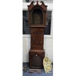 An early 19th Century oak and mahogany longcase clock, with eight day movement striking on a bell,
