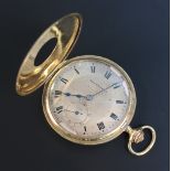 An 18ct gold keyless wind half hunting cased gentleman's pocket watch with a jewelled lever movement
