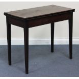 A George III mahogany fold-over tea table, raised on tapering block legs, height approx 72cm,