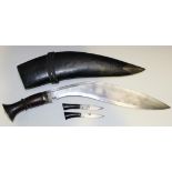 A kukri knife with curved single edged blade, length approx 33cm, with worn maker's mark at forte,