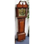 A George III oak and mahogany crossbanded longcase clock with eight day movement striking on a bell,