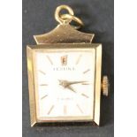 A Festina gold cased lady's pendant fob watch, the signed silvered dial with gilt baton shaped