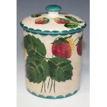 A Wemyss pottery preserve jar and cover, of cylindrical form, painted with strawberries and