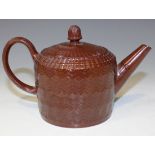 A Staffordshire Redware teapot and cover, mid-18th Century, the cylindrical body and cover with