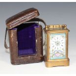 An early 20th Century French brass and enamel diminutive carriage timepiece, the dial with black