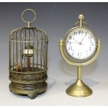 A 20th Century brass novelty timepiece in the form of a birdcage, the cylindrical dial with Arabic