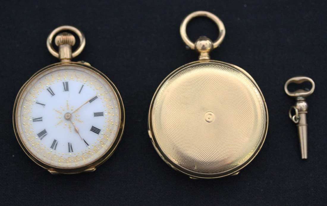 A gold keywind hunting cased lady's fob watch with an unsigned gilt jewelled lever movement, the