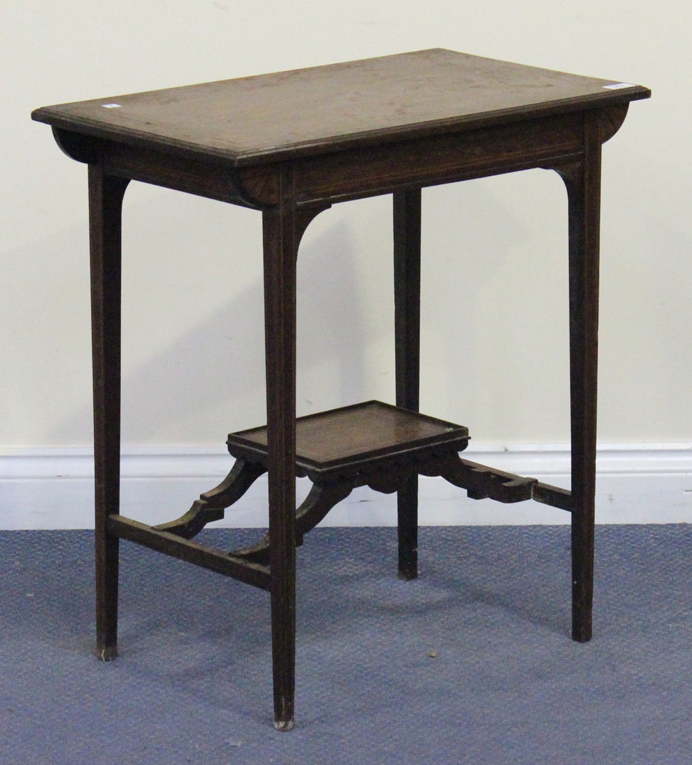 A late Victorian rosewood rectangular occasional table with inlaid decoration, on square tapering