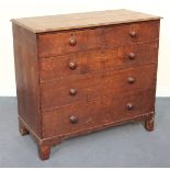 A George III oak chest of two short and three long graduated drawers, on shaped bracket feet, height