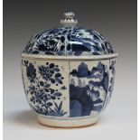 A Chinese blue and white porcelain jar and cover, Kangxi period, the steep sided 'U' form body