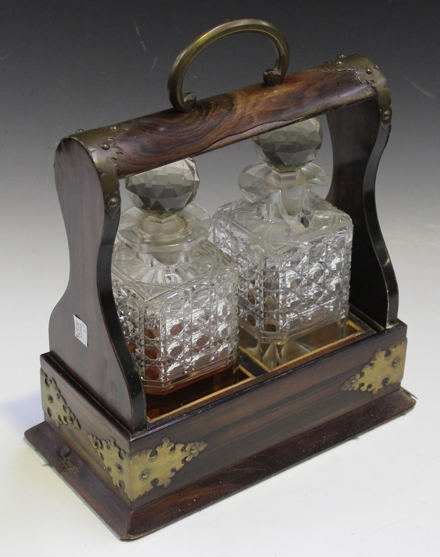 A late Victorian coromandel and brass mounted two bottle tantalus with hobnail cut glass - Image 2 of 4