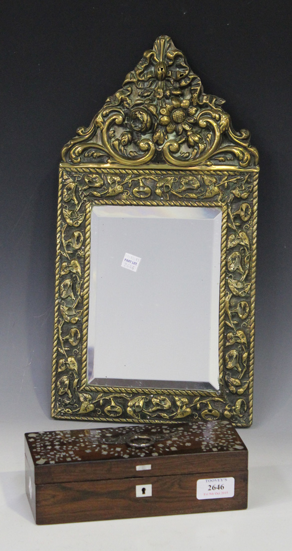 A 19th Century pressed brass framed wall mirror, height approx 44cm, and a Victorian rosewood and