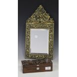 A 19th Century pressed brass framed wall mirror, height approx 44cm, and a Victorian rosewood and