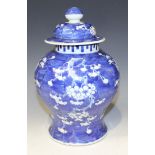 A Chinese blue and white porcelain jar and cover, mark of Kangxi but late 19th Century, the baluster